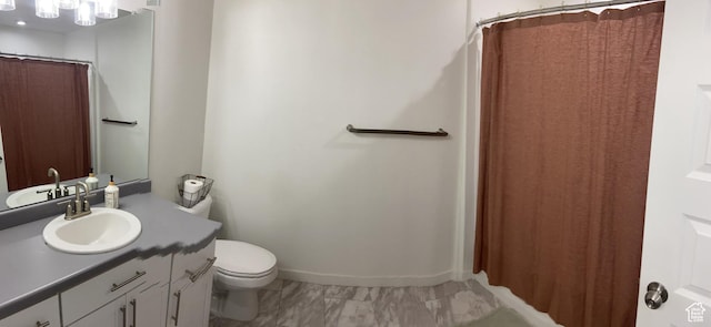 9372 N Scenic Mountain Dr W, Eagle Mountain, UT 84005 - bathroom with vanity, marble finish floor, and toilet
