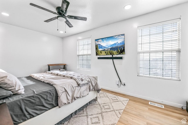 734 N 170 W, Tooele, UT 84074 - bedroom with baseboards, wood finished floors, visible vents, and recessed lighting