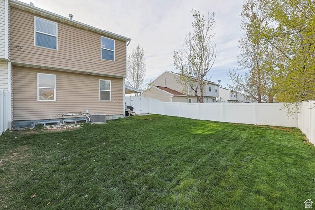 734 N 170 W, Tooele, UT 84074 - view of yard featuring cooling unit and a fenced backyard