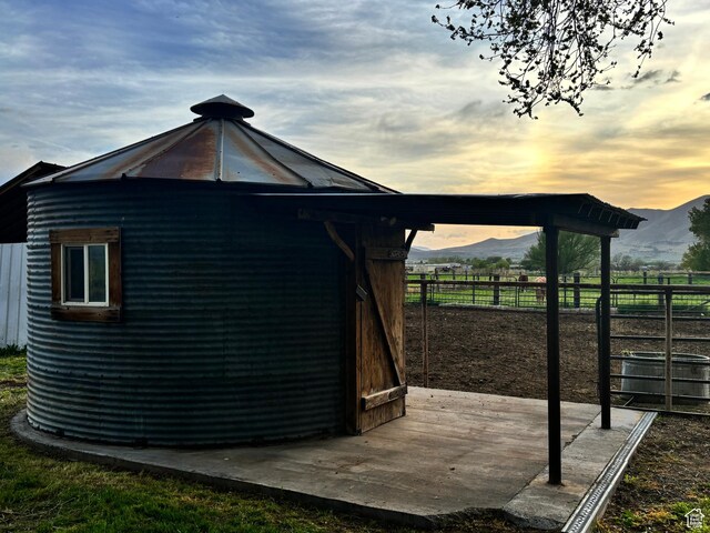 9762 S 3350 W, Payson, UT 84651 - view of home's exterior featuring fence, a mountain view, and an outbuilding