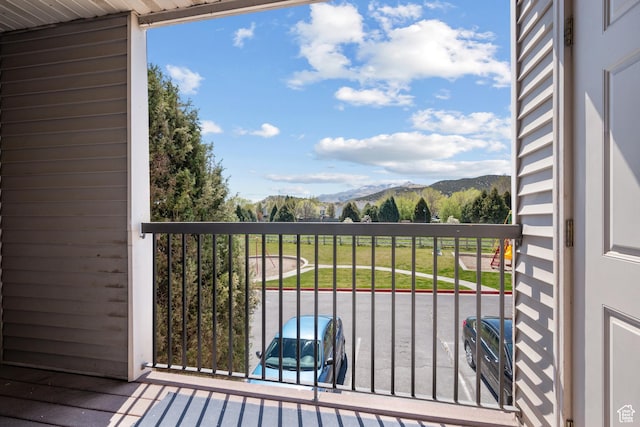 balcony featuring a mountain view