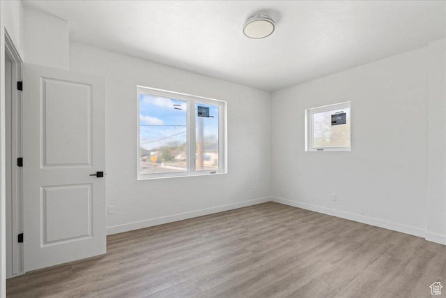 805 S 800 W Unit D, Salt Lake City, UT 84104 - unfurnished room with light wood-type flooring and baseboards