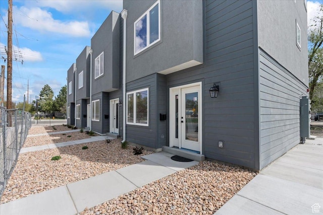 805 S 800 W Unit D, Salt Lake City, UT 84104 - view of front of house featuring fence and stucco siding