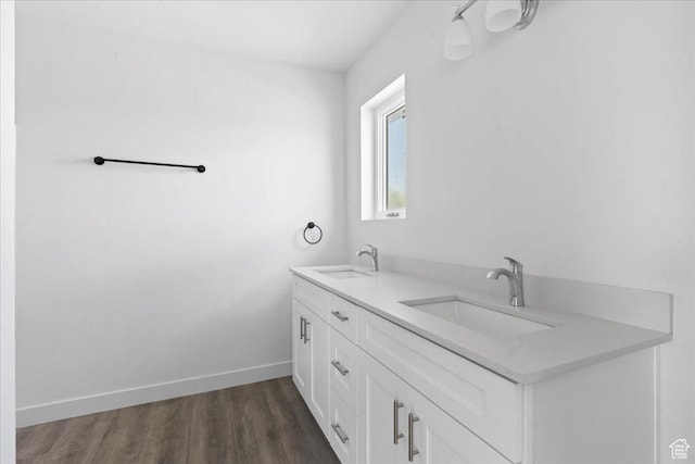 805 S 800 W Unit D, Salt Lake City, UT 84104 - full bath featuring baseboards, wood finished floors, a sink, and double vanity