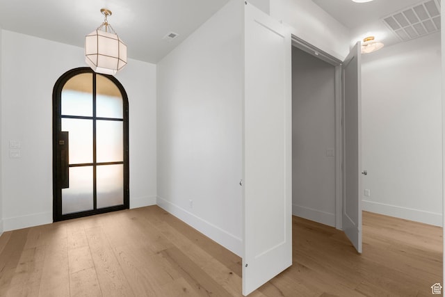 3382 E Ezra Ln, St George, UT 84790 - empty room with light wood-style floors, visible vents, and baseboards