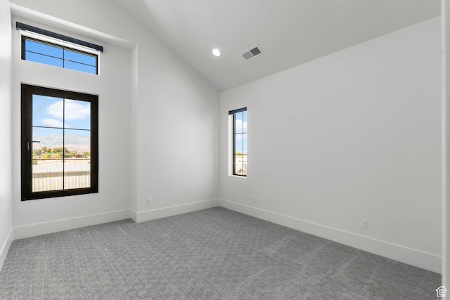 3382 E Ezra Ln, St George, UT 84790 - empty room with carpet floors, visible vents, and a healthy amount of sunlight