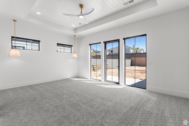 3382 E Ezra Ln, St George, UT 84790 - carpeted spare room with ceiling fan, a raised ceiling, wooden ceiling, baseboards, and visible vents