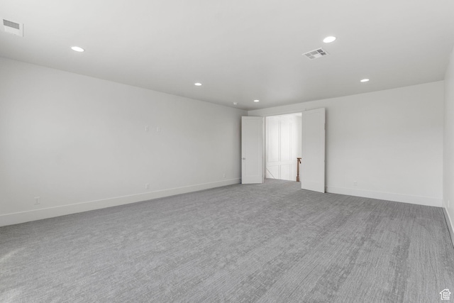 3382 E Ezra Ln, St George, UT 84790 - carpeted spare room with baseboards, visible vents, and recessed lighting