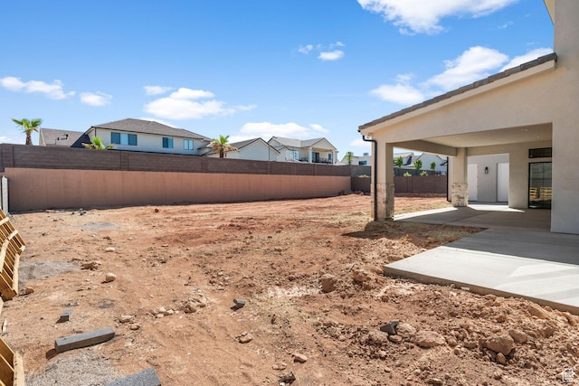 3382 E Ezra Ln, St George, UT 84790 - view of yard with a patio area and a fenced backyard