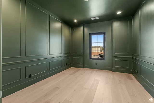 3382 E Ezra Ln, St George, UT 84790 - spare room featuring light wood-style flooring, visible vents, recessed lighting, and a decorative wall