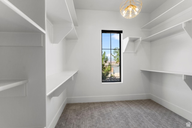 3382 E Ezra Ln, St George, UT 84790 - spacious closet featuring carpet and a notable chandelier