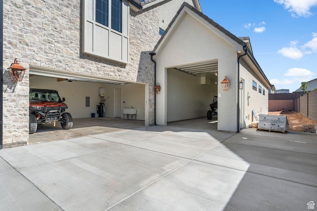 3382 E Ezra Ln, St George, UT 84790 - exterior space with driveway, a sink, and fence