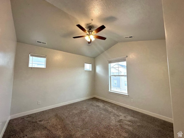 unfurnished room featuring baseboards, visible vents, and a ceiling fan