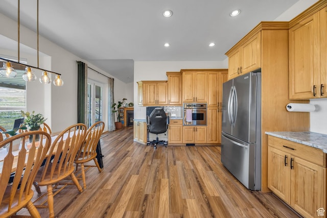 1563 Bryan Rd, Erda, UT 84074 - kitchen with recessed lighting, light wood-type flooring, pendant lighting, decorative backsplash, and appliances with stainless steel finishes
