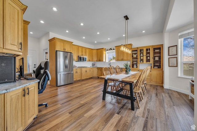 1563 Bryan Rd, Erda, UT 84074 - dining room featuring recessed lighting, light wood-style flooring, and baseboards
