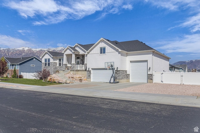 2364 N 2400 W, Farr West, UT 84404 - craftsman house featuring a gate, fence, and a mountain view