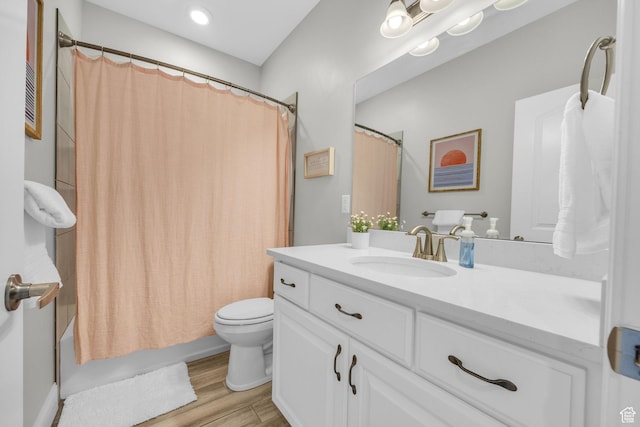 2364 N 2400 W, Farr West, UT 84404 - full bath with shower / tub combo with curtain, wood finished floors, vanity, and toilet