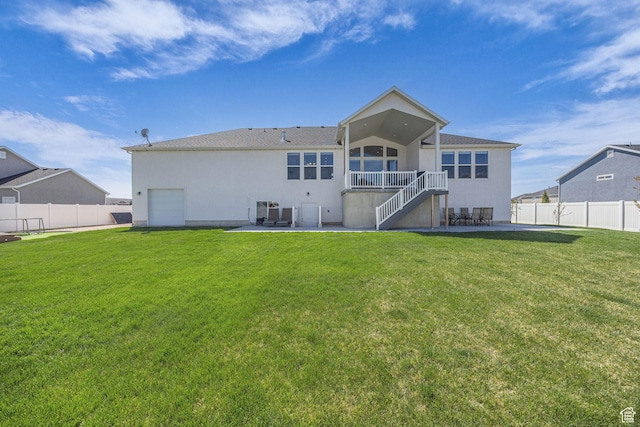 2364 N 2400 W, Farr West, UT 84404 - back of house with stairway, a patio, stucco siding, and fence