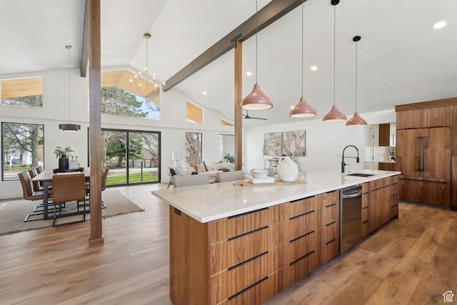 kitchen with a sink, beam ceiling, a large island, modern cabinets, and dishwasher