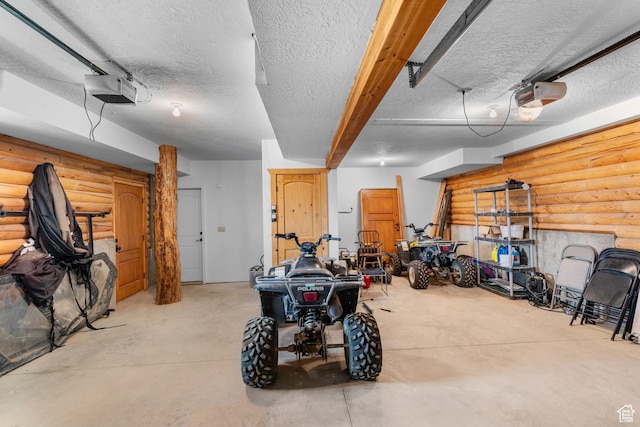 2292 S Aspen Loop, Garden City, UT 84028 - garage featuring a garage door opener
