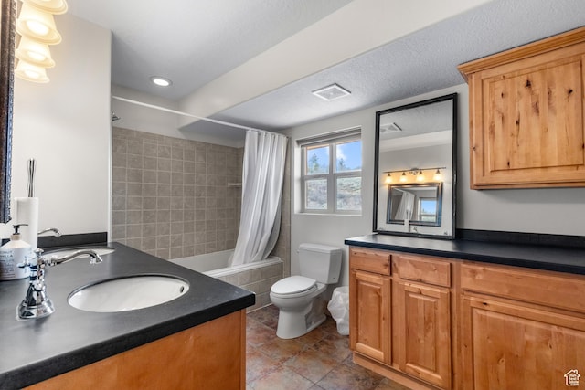 2292 S Aspen Loop, Garden City, UT 84028 - full bathroom featuring recessed lighting, tile patterned flooring, tiled shower / bath, toilet, and vanity