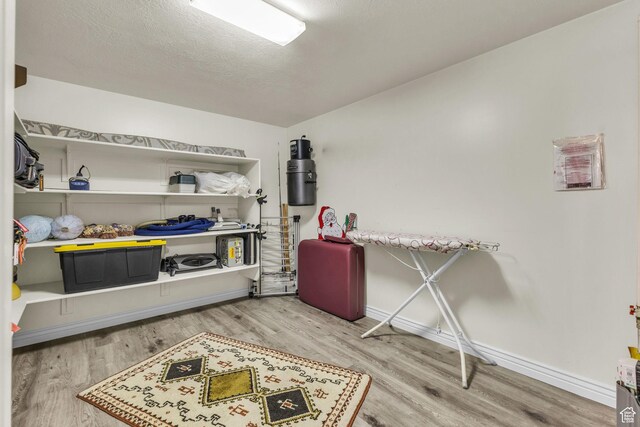 305 E 3700 N, North Ogden, UT 84414 - misc room featuring baseboards, wood finished floors, and a textured ceiling