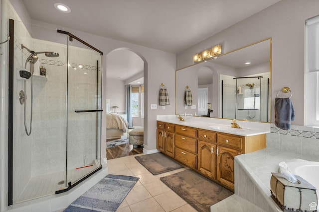 305 E 3700 N, North Ogden, UT 84414 - ensuite bathroom with tile patterned floors, a sink, double vanity, a shower stall, and connected bathroom