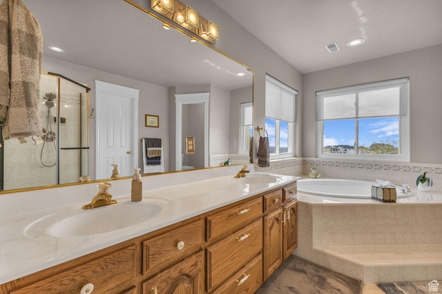 305 E 3700 N, North Ogden, UT 84414 - bathroom featuring a garden tub, a sink, a stall shower, double vanity, and visible vents
