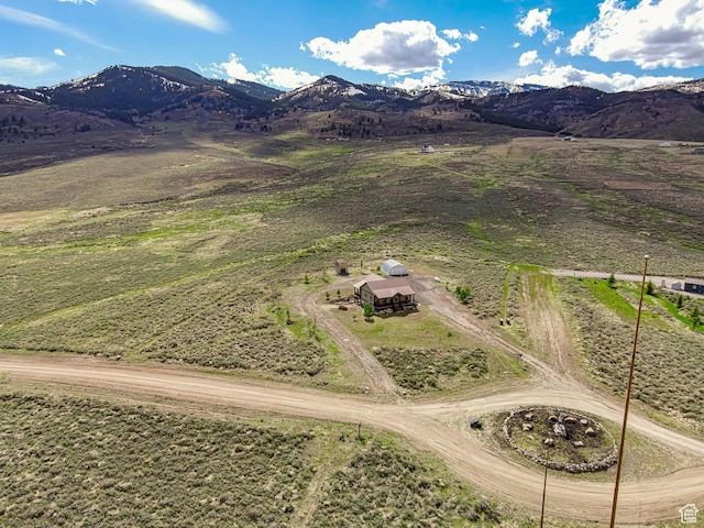 mountain view featuring a rural view