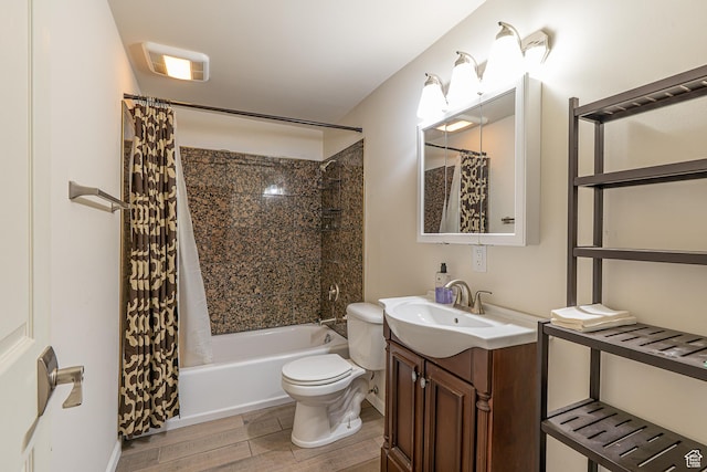 full bath with shower / bath combination with curtain, wood finished floors, visible vents, toilet, and vanity