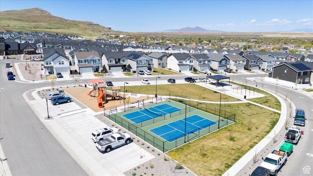 bird's eye view featuring a residential view and a mountain view