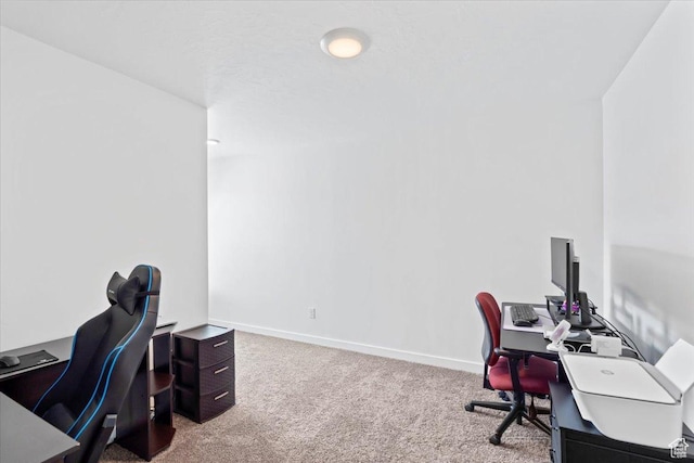 carpeted office with baseboards