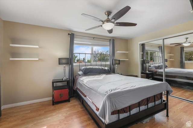 498 E 3000 N, North Ogden, UT 84414 - bedroom with wood finished floors, a closet, a ceiling fan, and baseboards