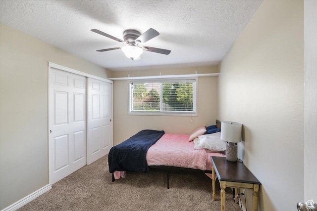 498 E 3000 N, North Ogden, UT 84414 - carpeted bedroom featuring a textured ceiling, a closet, and ceiling fan