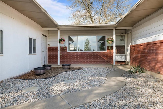 498 E 3000 N, North Ogden, UT 84414 - doorway to property featuring brick siding
