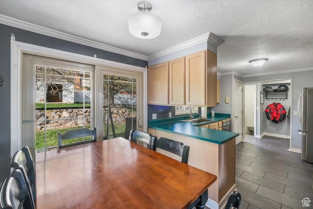 498 E 3000 N, North Ogden, UT 84414 - kitchen featuring stainless steel appliances, a sink, a textured ceiling, dark countertops, and baseboards