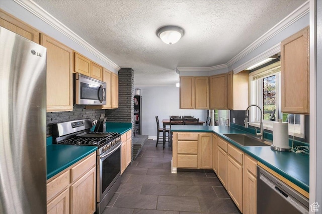 498 E 3000 N, North Ogden, UT 84414 - kitchen featuring ornamental molding, light brown cabinetry, stainless steel appliances, and a sink