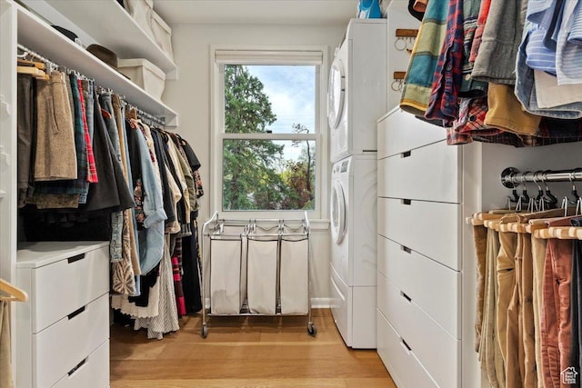 1904 E Yalecrest Ave S, Salt Lake City, UT 84108 - spacious closet featuring light wood-style flooring and stacked washing maching and dryer