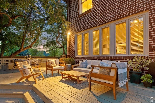 1904 E Yalecrest Ave S, Salt Lake City, UT 84108 - deck at dusk featuring an outdoor living space