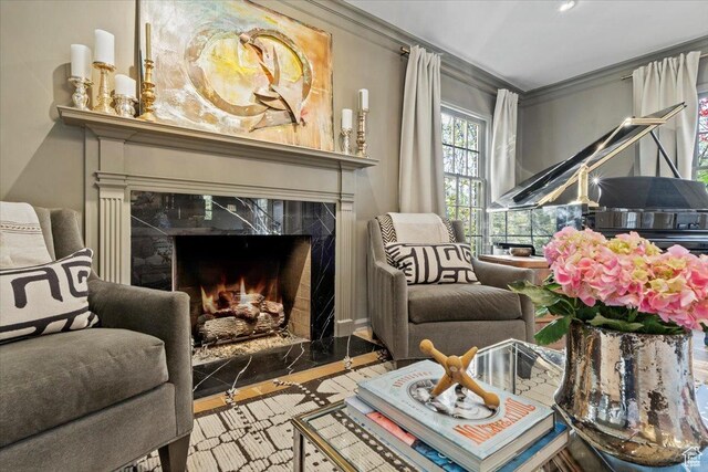 1904 E Yalecrest Ave S, Salt Lake City, UT 84108 - living area with ornamental molding, wood finished floors, and a fireplace