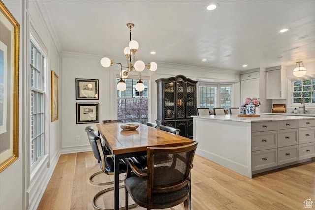 1904 E Yalecrest Ave S, Salt Lake City, UT 84108 - dining area featuring light wood finished floors, baseboards, recessed lighting, a chandelier, and crown molding
