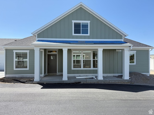 4 S 3830 W Unit 418, West Point, UT 84015 - bungalow featuring board and batten siding, a porch, and a shingled roof