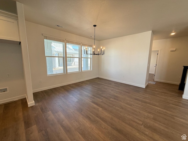 4 S 3830 W Unit 418, West Point, UT 84015 - unfurnished dining area with a chandelier, baseboards, and dark wood-style floors