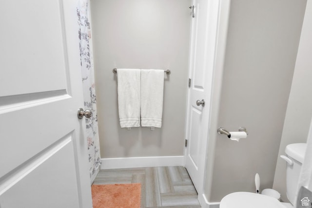 1153 E 2850 N, North Ogden, UT 84414 - bathroom featuring toilet and baseboards