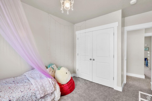 1153 E 2850 N, North Ogden, UT 84414 - carpeted bedroom featuring a closet and baseboards