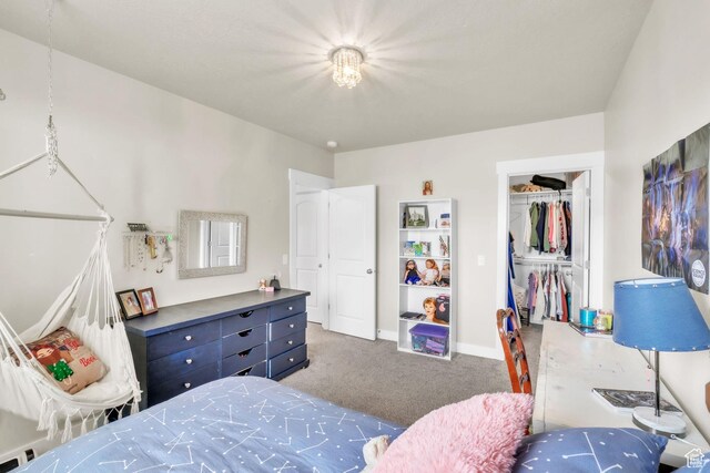 1153 E 2850 N, North Ogden, UT 84414 - carpeted bedroom with a walk in closet, a closet, and baseboards