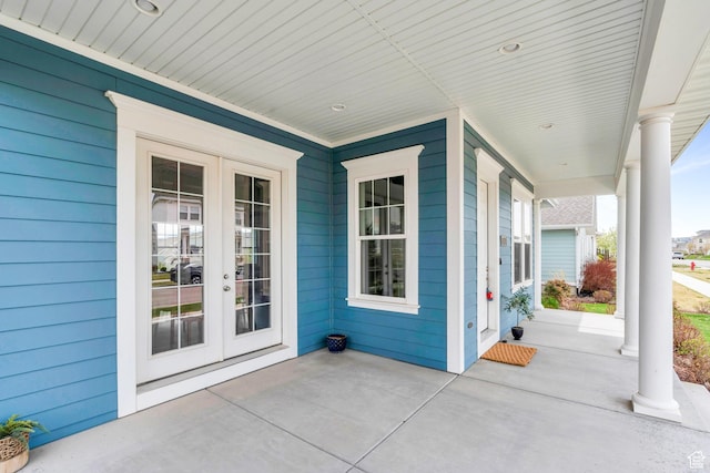 view of patio / terrace featuring covered porch and french doors