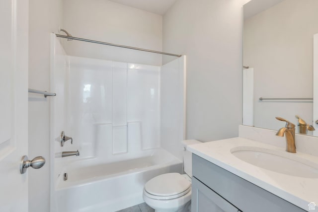 full bathroom featuring shower / bathtub combination, vanity, and toilet