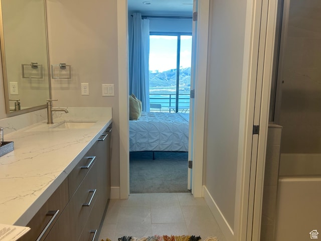 801 E Klaim Dr N, Hideout, UT 84036 - bathroom with vanity, baseboards, and connected bathroom
