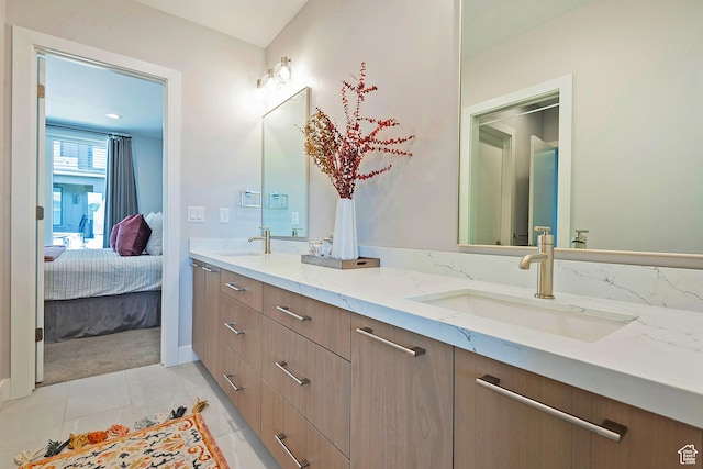 801 E Klaim Dr N, Hideout, UT 84036 - bathroom featuring connected bathroom, double vanity, tile patterned flooring, and baseboards